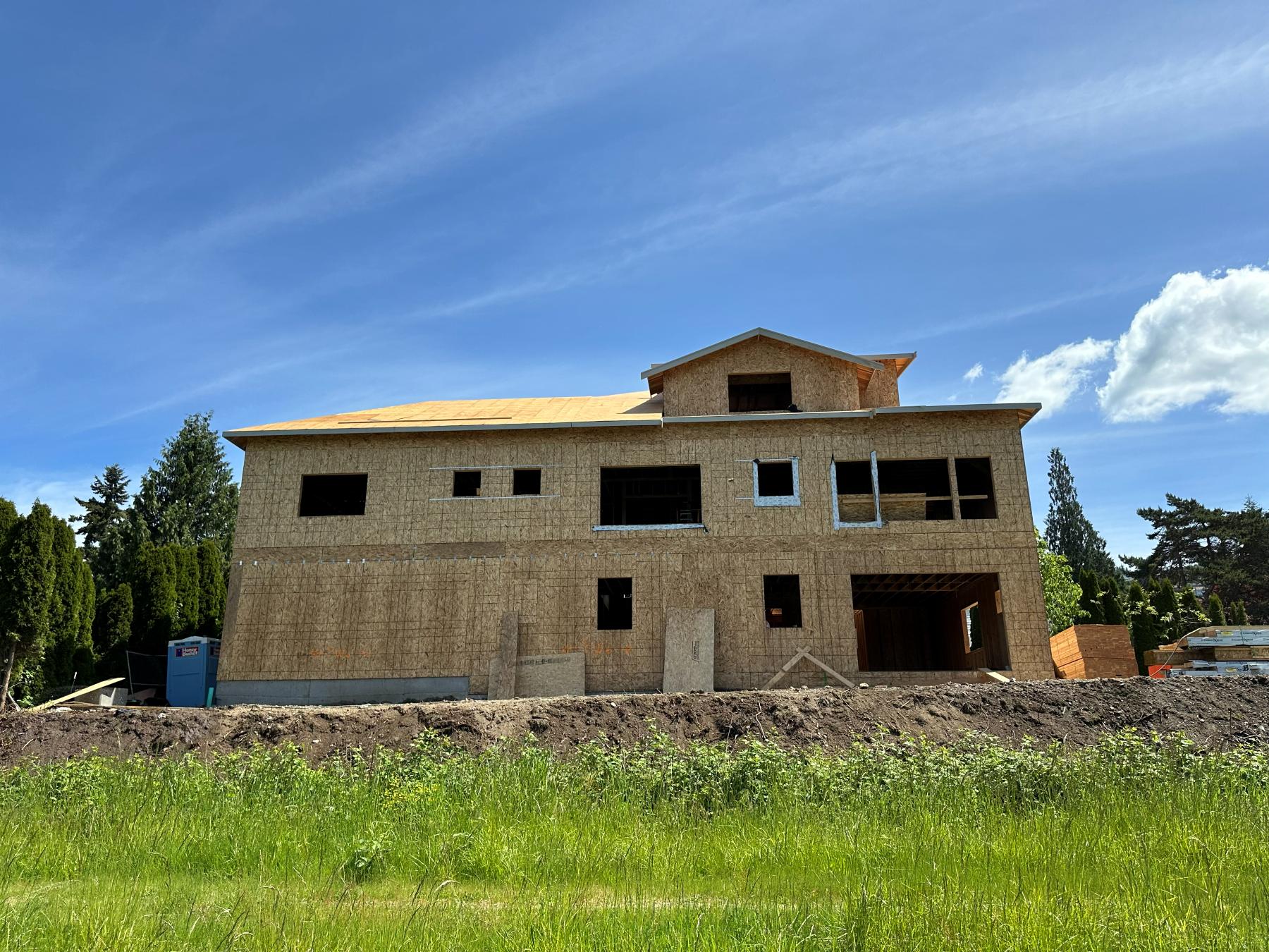Large custom home fully framed and sheathed with complex roof lines, Greater Seattle Area